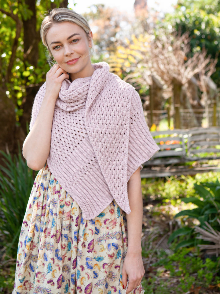 Euclid asymmetrical shawl with lattice cable and eyelet stitchwork and a deep ribbed border